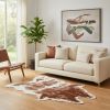 4' X 5' Brown and Ivory Faux Cowhide Animal Print Printed Area Rug