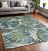 5' X 8' Beige Teal and Green Tropical Botanical Leaves Area Rug