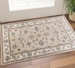 3' X 5' Beige and Ivory Floral Area Rug