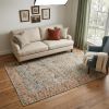 5' X 7' Green and Ivory Floral Hand Woven Area Rug