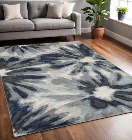 5' X 8' Ivory Blue Machine Woven Floral Indoor Area Rug