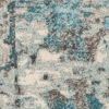 5' X 8' Ivory Teal Machine Woven Abstract Indoor Area Rug