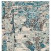 5' X 8' Ivory Teal Machine Woven Abstract Indoor Area Rug