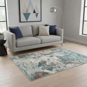 5' X 8' Ivory Teal Machine Woven Abstract Indoor Area Rug