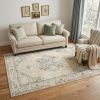 5' X 8' Beige And Ivory Center Jewel Area Rug