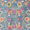 5' X 7' Blue And Orange Floral Power Loom Area Rug