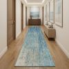 10' Ivory And Blue Abstract Power Loom Runner Rug