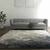 5' X 7' Gray And Ivory Abstract Power Loom Area Rug