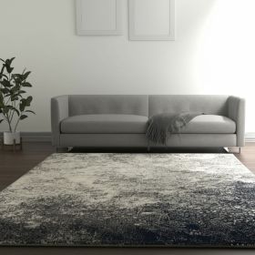 5' X 7' Gray And Ivory Abstract Power Loom Area Rug