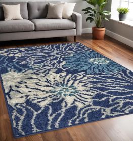 5' X 7' Blue And Ivory Floral Power Loom Area Rug