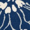 5' X 7' Blue And Ivory Floral Power Loom Area Rug