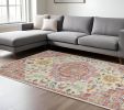 7' X 10' Pink And Ivory Southwestern Dhurrie Area Rug