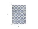 4' X 6' Blue And Ivory Floral Dhurrie Area Rug