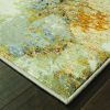5' X 7' Gold and Ivory Power Loom Area Rug