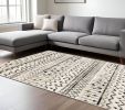 10' X 13' Ivory And Black Eclectic Patterns Indoor Area Rug