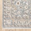 9' X 12' Blue Ivory Machine Woven Floral Oriental Indoor Area Rug