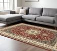 7' X 10' Red Ivory Machine Woven Oriental Indoor Area Rug
