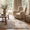 5' X 8' Beige And Ivory Abstract Area Rug
