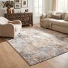 5' X 8' Beige And Ivory Abstract Area Rug