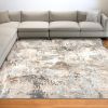 7' X 10' Beige And Ivory Abstract Area Rug
