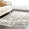 5' X 8' Beige And Gray Distressed Area Rug